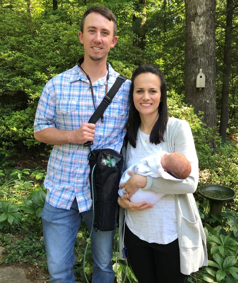 Family in nature with small baby
